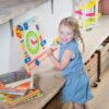 New Classic Toys educatief leerspeelgoed – kalenderklok rechtopstaand